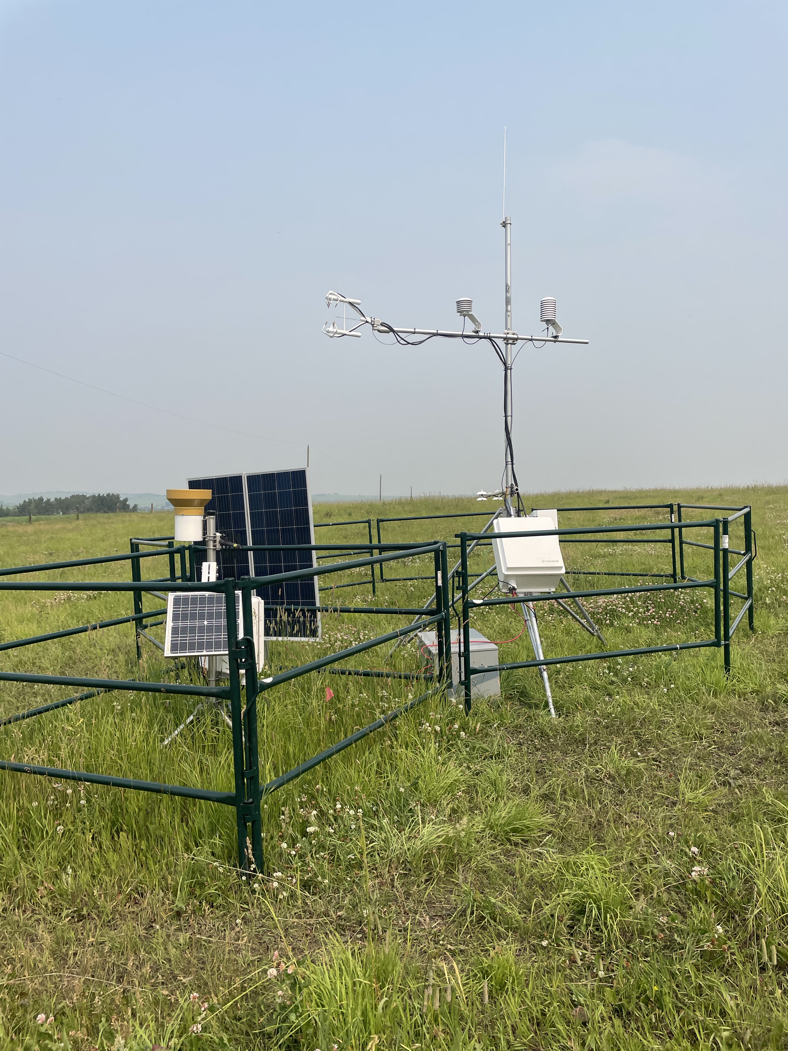 Left: Rain gauge and soil moisture and temperature probe, Right: Eddy covariance tower